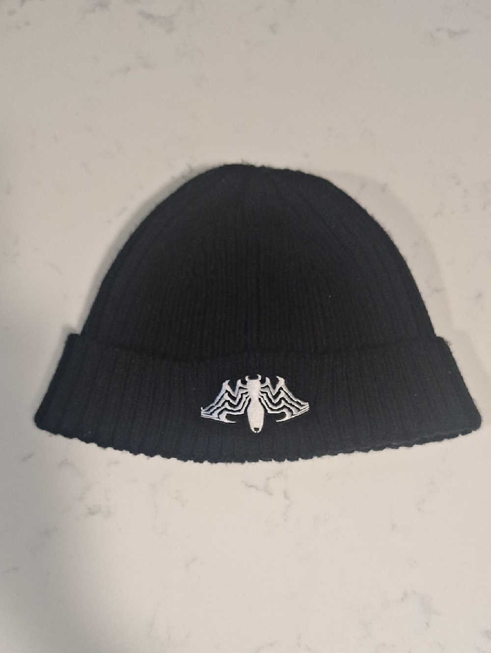 Marvel Black Ribbed Beanie with White Embroidered Moth Logo